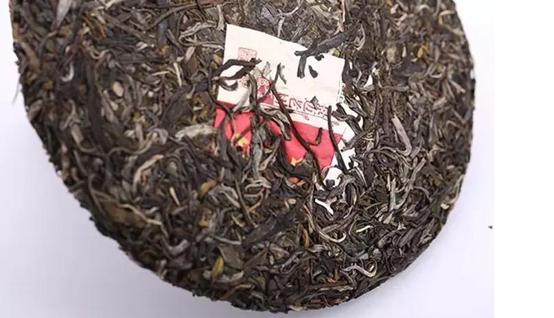 Чжун Ча Цзинмай Лао Шу, шэн пуэр, поверхность чайного блина